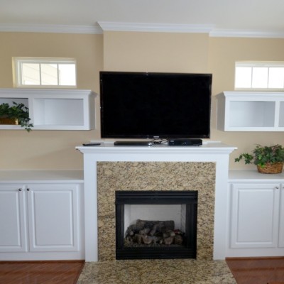 Simple fireplace built-in's offered a clean upgrade at an affordable cost. We didn't have to modify the mantel.