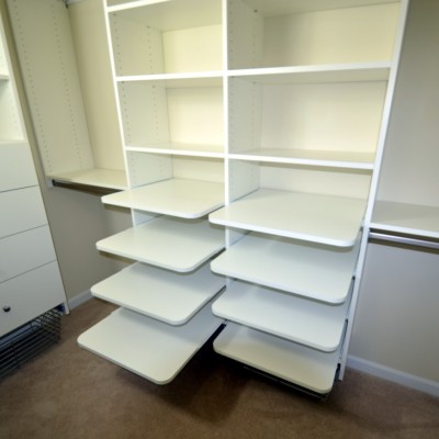 Another shoe shrine! Deep pull-out shelves (with nice rounded corners) display 6 pairs per shelf.