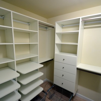 There are a lot of "goodies" packed into this moderate walk-in. His and her's everything (lucky guy)! Shoe shelves, drawers, baskets, single/double/and even mid-length hanging spaces too.