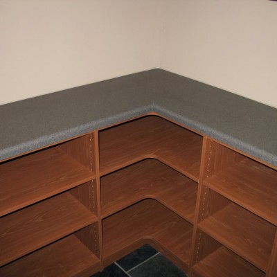 Another pantry "takes a curve." When a side wall can't be best served with a stand alone cabinet, filling out a corner like this is the perfect solution.