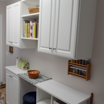 Perfect matching addition to a narrow "galley" style kitchen, added much needed storage in a senior's "downsizing" home. Rounded counter top corners for safety!