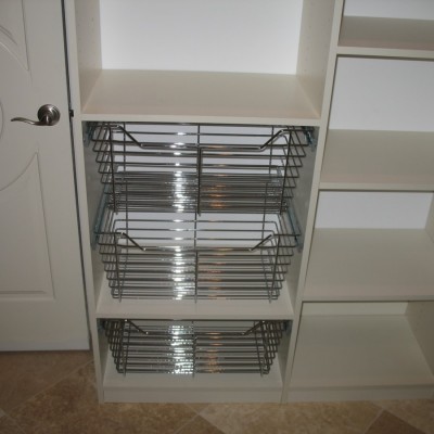 Pantry pull-out baskets. Here motion makes sense.