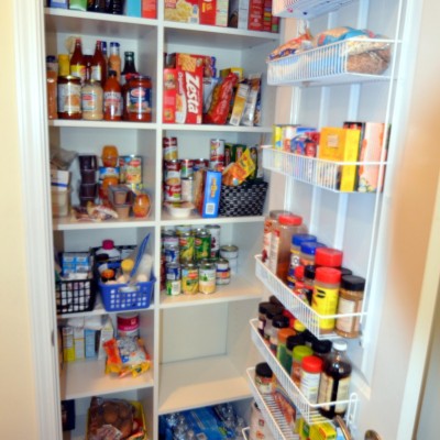 Pantry with adjustable shelves and narrow storage on the door make this "work."