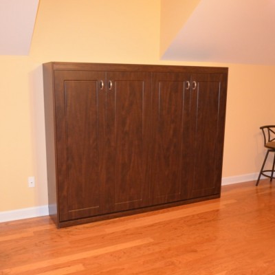 Is it a four door cabinet? Of course not. But it is a great looking way to fit a lateral tilt wall bed under a "knee wall" in a bonus room.